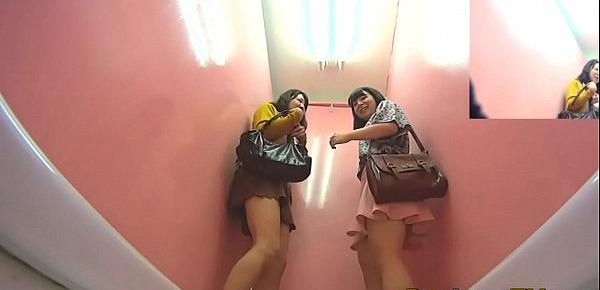  Asian babes squat and piss in public toilet